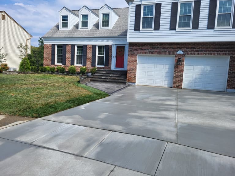 The finished driveway and widened apron seen from the street in Annapolis