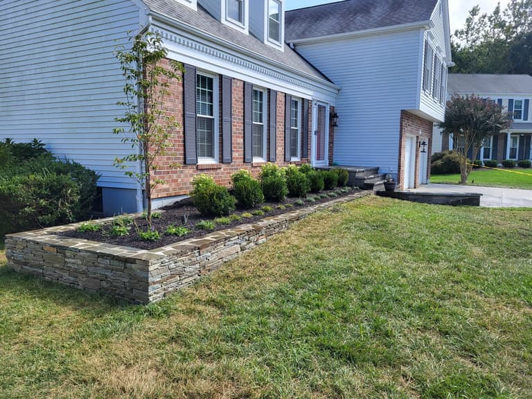 After — the bluestone treads and paver risers stepping up from the landing to the front door